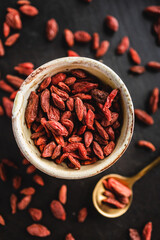 Close-up of goji berries on a black background