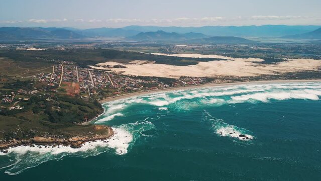 Aerial view of the Brazilian coastline with rough Atlantic Ocean. Area near the town of Imbituba