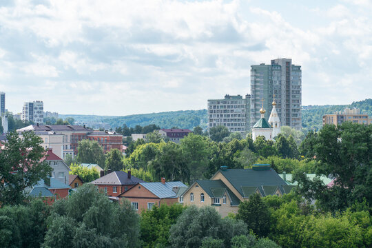 Cityscape of a green residential area with buildings in the city of Cheboksary, Russia