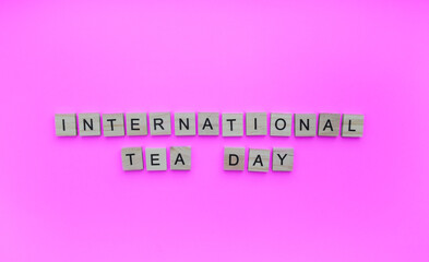 December 15, International Tea Day, minimalistic banner with the inscription in wooden letters