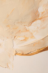 Art oil and acrylic smear blot canvas painting stucco wall. Abstract texture pastel beige, gold...