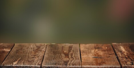 Fototapeta premium Wooden surface on the background of a blurred backdrop