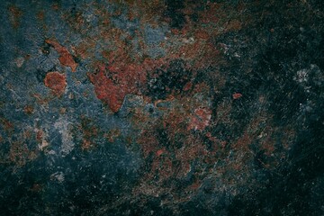 Old metal covered with blue peeling paint