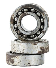 Bearing on a white background. Old worn bearing covered with rust