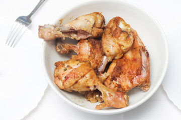 Chicken legs recipe. Cheap dinner idea background. Crunchy chicken skin. Lunch meat snack. Roasted...