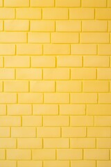 Yellow brick wall background.