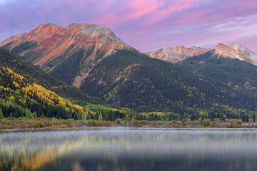 Foggy autumn landscape at dawn of Crystal Lake and Red Mountain, San Juan Mountains, Colorado, USA