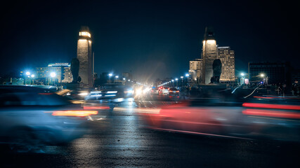 Cars driving on traffic ring near Qasr El Nil Bridge in Cairo, Egypt. Traffic in night Cairo
