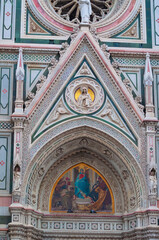 Details of the exterior of the di Santa Maria del Fiore or Cathedral of Saint Mary of the Flower - the main church of Florence, Tuscany, Italy.