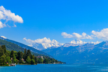Obraz premium View of the Annecy lake surrounded by beautiful mountains in Annecy, France