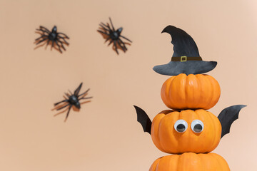 Halloween banner, cute pumpkins with eyes and funny faces. Witch hat. Set pumpkin monsters and...
