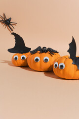 Halloween banner, cute pumpkins with googly eyes. Witch hat. Set orange pumpkin monsters and...