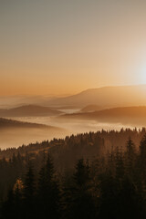 As the first light of dawn gently kisses the horizon, the mountains awaken in a symphony of natural beauty.
