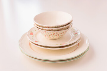 Closeup of porcelain plates and bowls