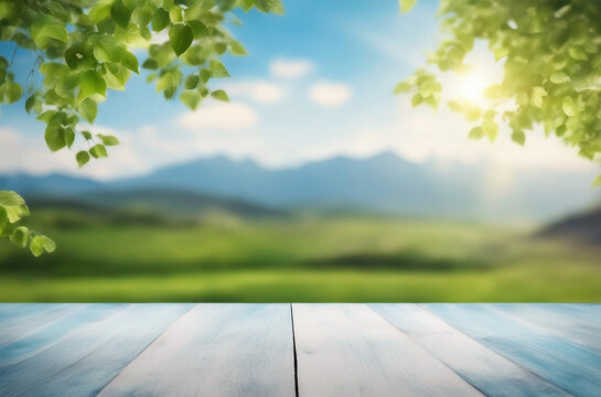 A wooden empty table and a blurred mountain landscape with sun and blue sky. Background nature wallpaper decoration