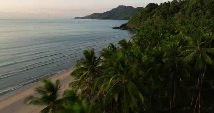 Drone view above the sea of a secret beach in El Nido