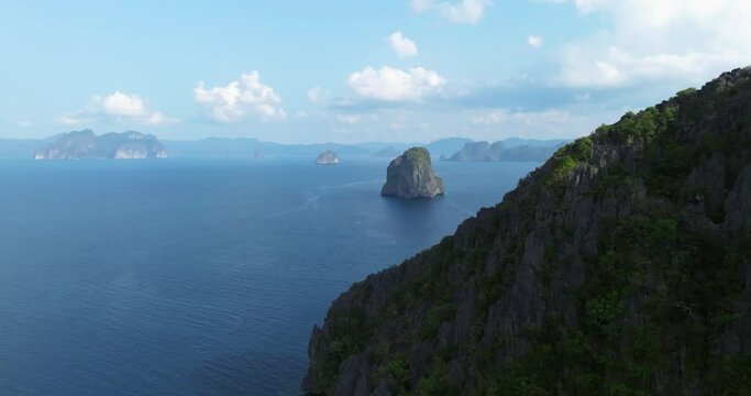 Drone view above the sea of a rock formation in El Nido, Palawan, Philippines