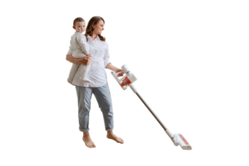 Happy woman holds baby and wireless portable vacuum cleaner, isolated on a white background. A smiling woman with a child in her arms cleans the floor in an apartment with a vacuum cleaner