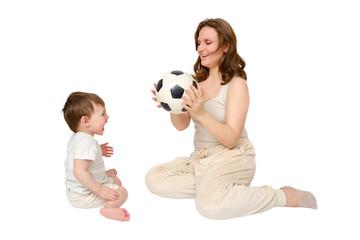 Happy baby with mother play with fotball ball on studio, isolated on white background. Portrait of a smiling child with mom and playing while sitting on the floor