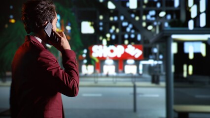 Entrepreneur on phone call walking around town, enjoying promenade while he talks on smartphone. Businessman looking around at skyscrapers, strolling near busy urban center. Handheld shot.