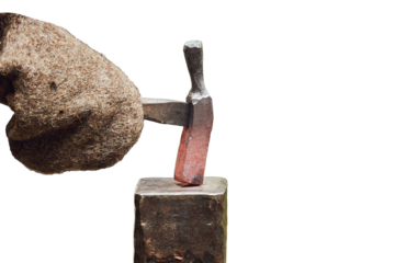 Work of a medieval blacksmith for the manufacture of metal products, isolated on a white background. Reconstruction of the events of the Middle Ages in Europe.