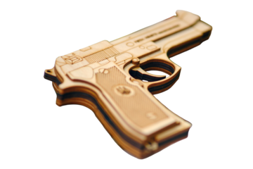 Toy ussr wooden pistol on the table in the store, isolated on white background