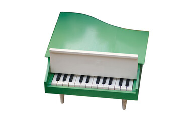 Small toy piano of the USSR era, isolated on white background. The concept of music and...