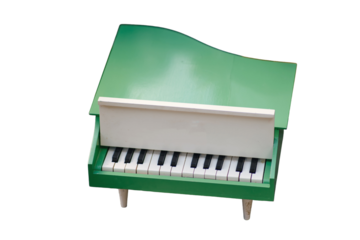 Small toy piano of the USSR era, isolated on white background. The concept of music and entertainment, isolated on white background.