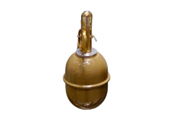 An army hand grenade used for imitation explosive effects in mock-up war games, isolated on white background.
