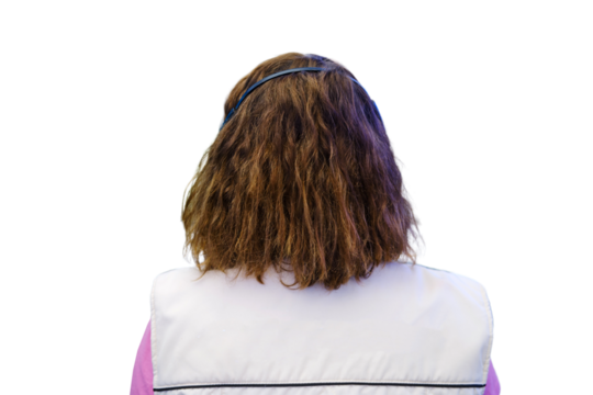 Rear view of a young woman working in a call center, isolated on white background.