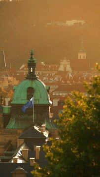 landscape with Straka Academy dome in the evening in autumn in Prague, Czech Republic.