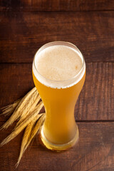 Glass full of German wheat beer.