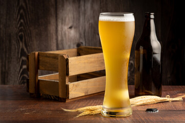 Glass full of German wheat beer.