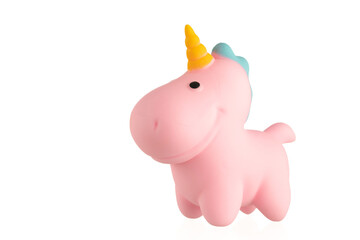 Pink unicorn toy on a whit background. 
Soft toy unicorn.
Squishy Toys. 