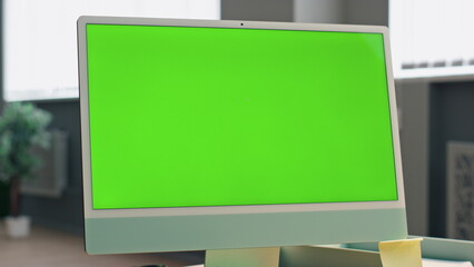 Zoom out mockup monitor in office. Close up employee talking chroma key device