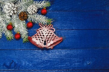 Christmas decorative background. Christmas tree, ornaments and baubles on the wooden boards. - 659687333