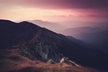 natural landscape with purple sky and fog between the mountains
