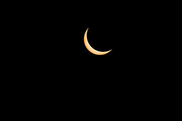 Solar Eclipse Crescent and Sun Spots