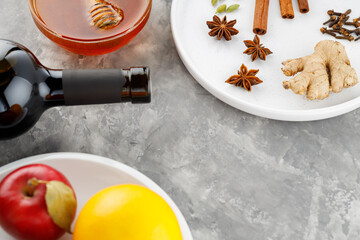 Ingredients for mulled wine on gray background. Top view
