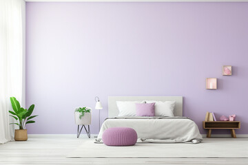 Wide angle view of a teen girl's bedroom with a blank wall