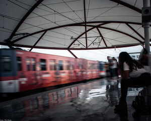 Woman waiting for the subway in the city of Monterrey, Mexico