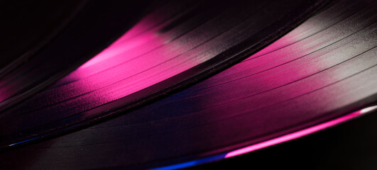 multicolored abstract music show party dj background with vinyl disc.close-up of vinyl record in...