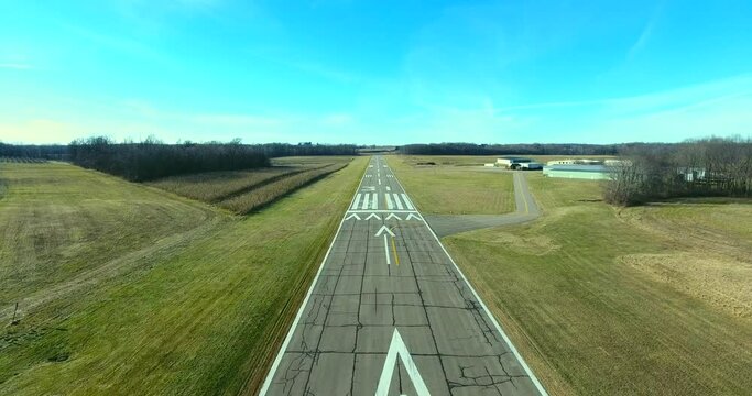 4K Aerial Low Pass Over Airport Runway Operated With Permission