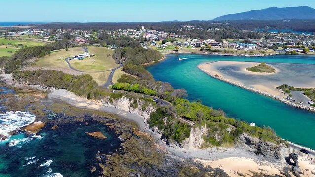 Drone aerial landscape shot of Narooma channel headland carpark lookout Wagonga beach sea ocean Inlet South Coast NSW Australia travel tourism 4K