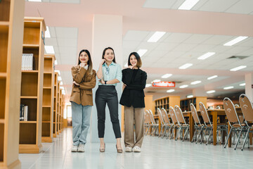 University College instructors and advisors meet female college students to advise their research study. University in classroom campus, college professor teacher and asian students discuss, teamwork  - obrazy, fototapety, plakaty