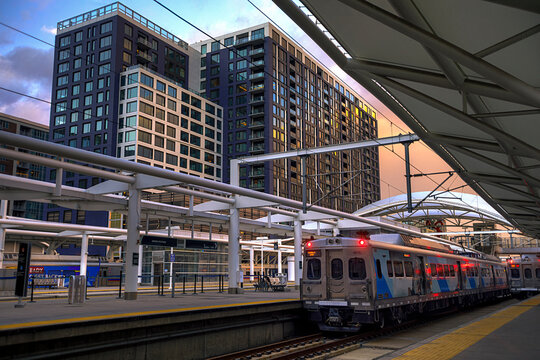 H.D.R. image of three light rail trains preparing for departure from Denver's Union Station at sunset