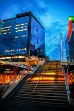The Millennium Bridge nestled between to buildings in lower downtown Denver.