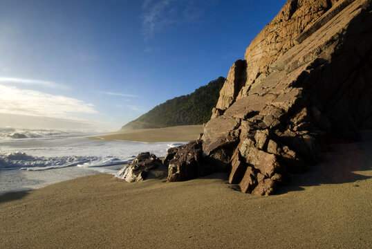 Rocks on Scotts Beach at the start of the Heaphy Track on the West Coast, South Island, New Zealand.