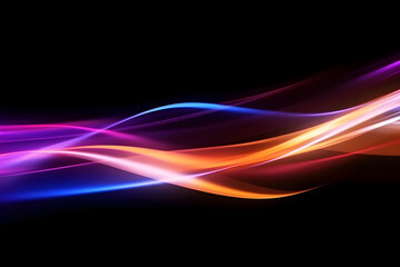 Abstract colorful glowing light trails on a black background