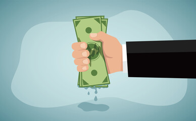 Economic shrink, Tight budget and recession shrinking economy. Pack of money dollar bills squeezed by hand.